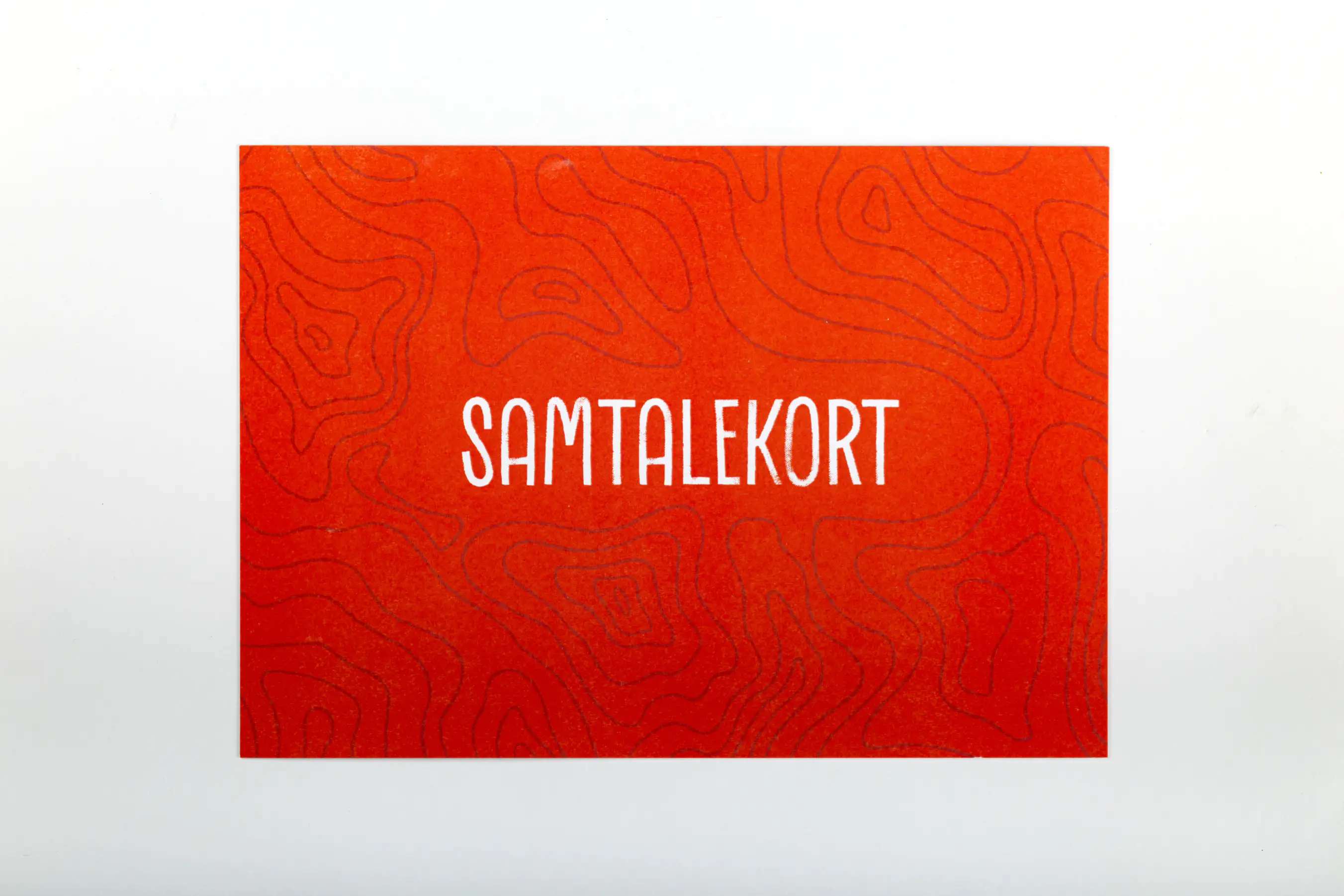 Bagsiden af samtalekortene med teksten samtalekort.